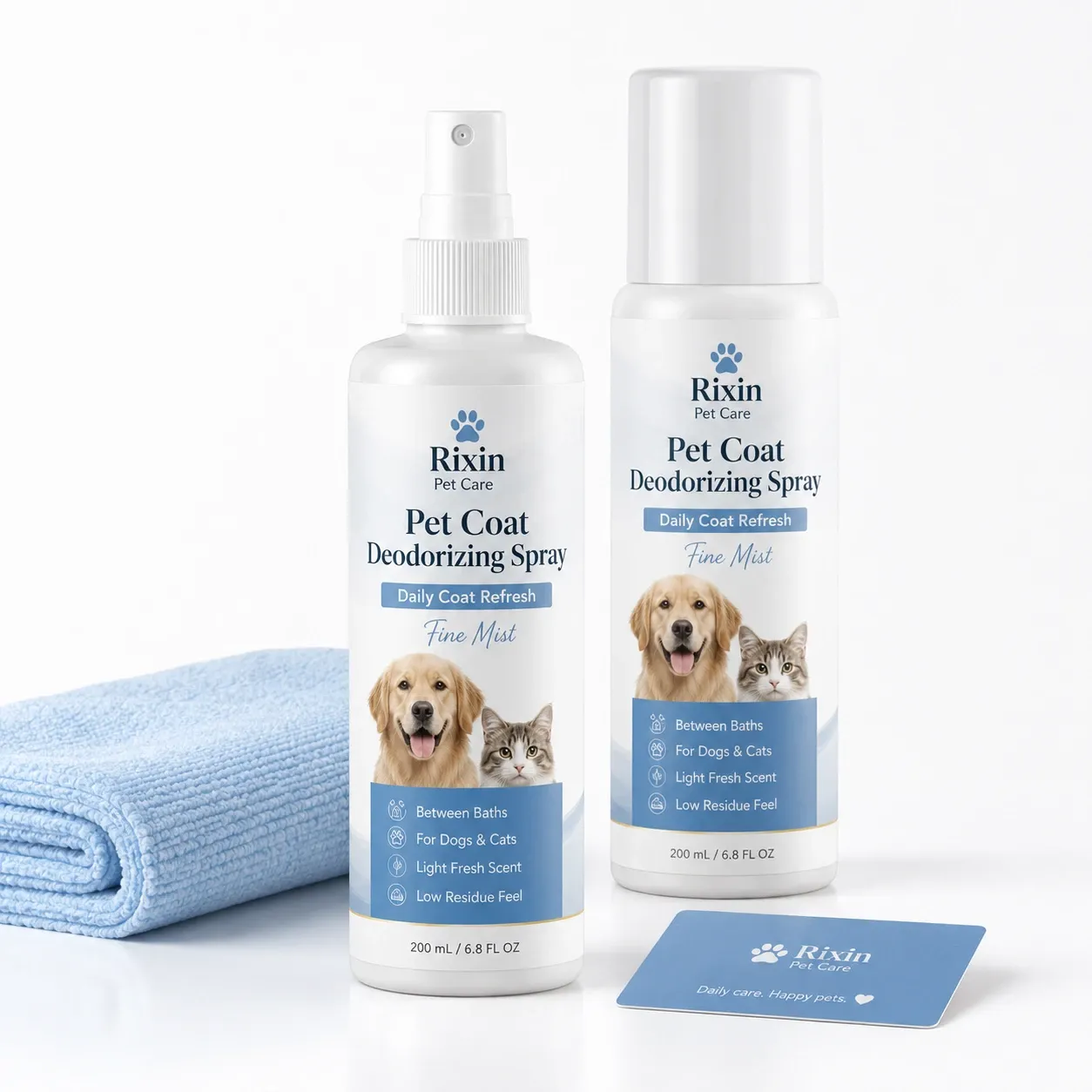 Two Rixin Pet Care fine mist pet coat deodorizing spray bottles with daily coat refresh labels and a folded blue towel