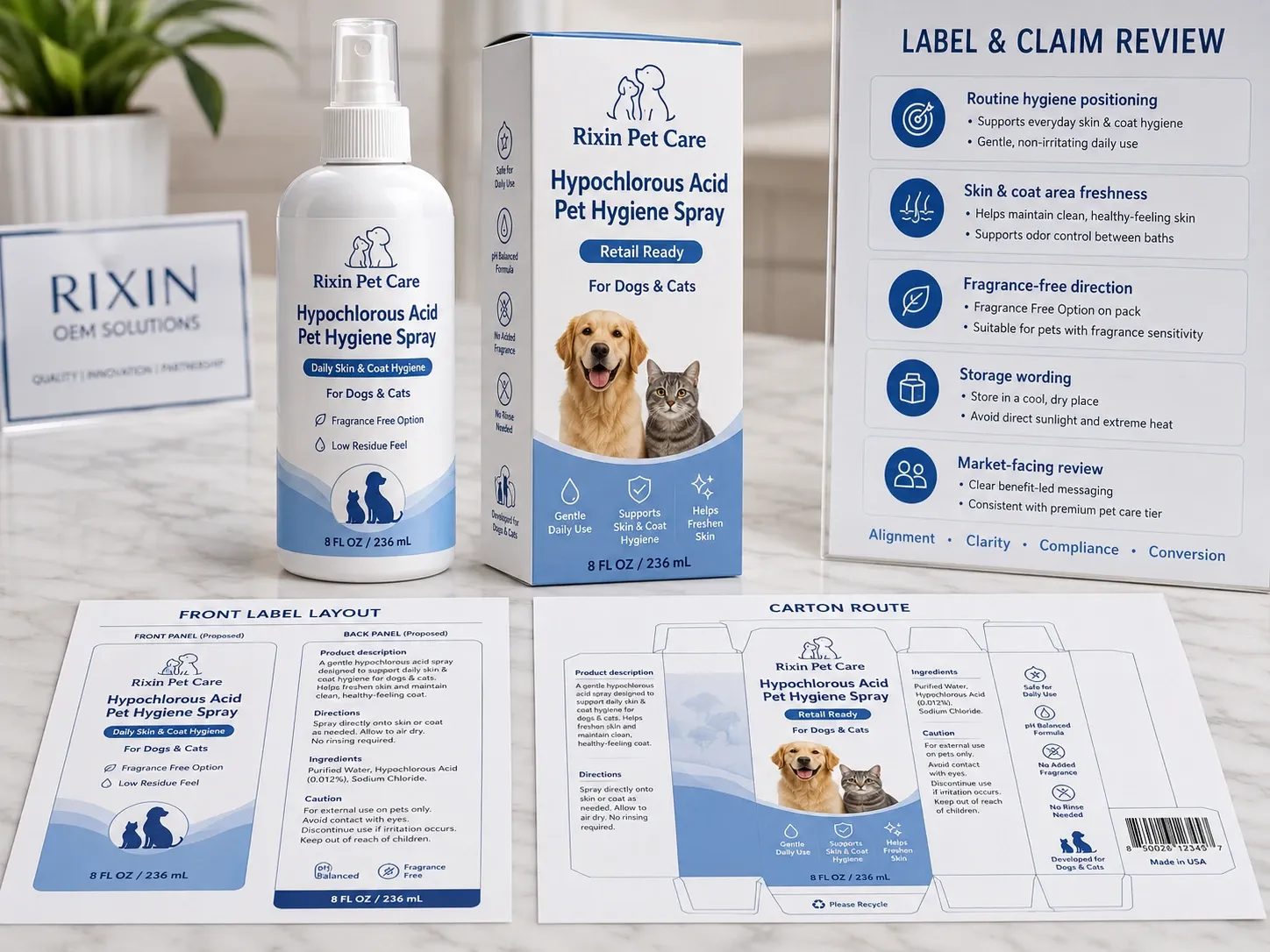Label and claim review board with hypochlorous acid pet hygiene spray bottle, retail carton, front label layout, carton route sheet, and wording review panel